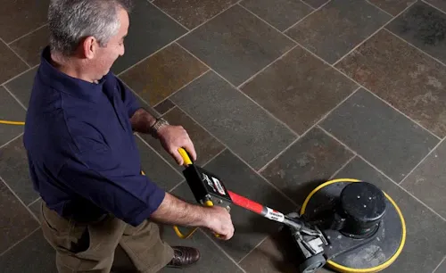 Janitorial_ManWaxingTileFloor